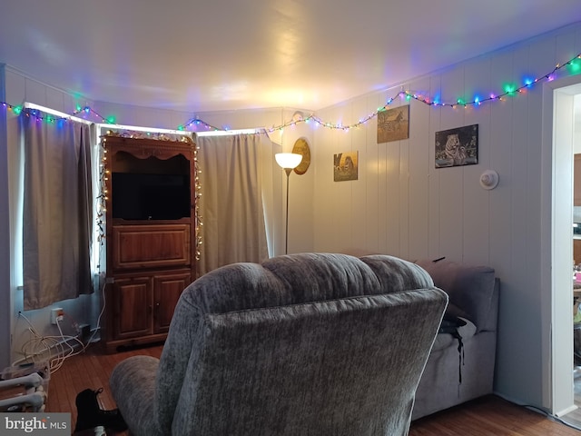 living room with wood finished floors