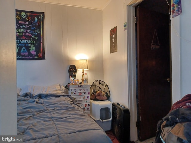 bedroom with crown molding