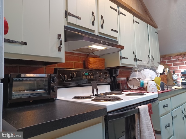 kitchen with electric range oven, tasteful backsplash, white cabinetry, and under cabinet range hood