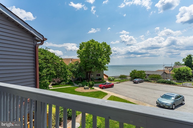 exterior space with a water view