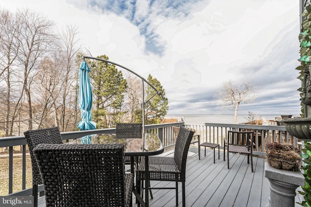 deck featuring outdoor dining area