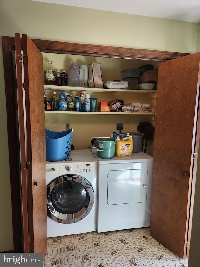 laundry area with laundry area and washer and dryer