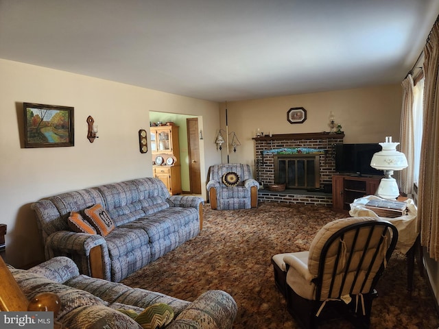 carpeted living room featuring a brick fireplace