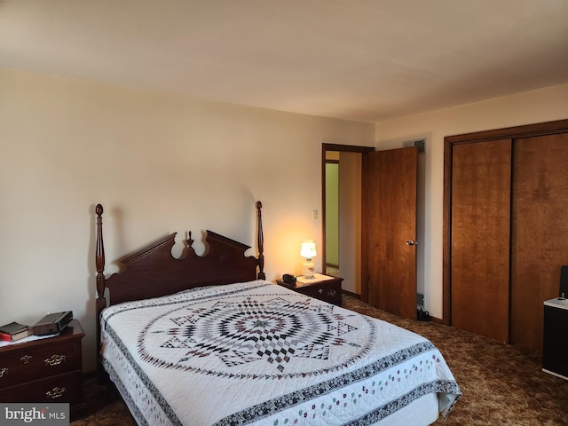 bedroom featuring a closet, visible vents, and carpet flooring