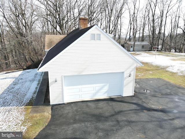 garage with driveway