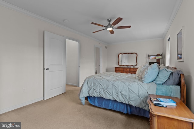 bedroom with a ceiling fan, light colored carpet, crown molding, and baseboards