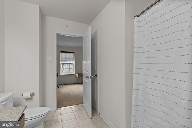 full bath with baseboards, toilet, tile patterned floors, curtained shower, and vanity