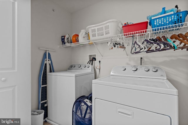 laundry room featuring independent washer and dryer