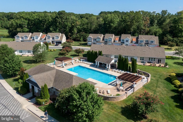 view of pool featuring a gazebo, a lawn, and a residential view