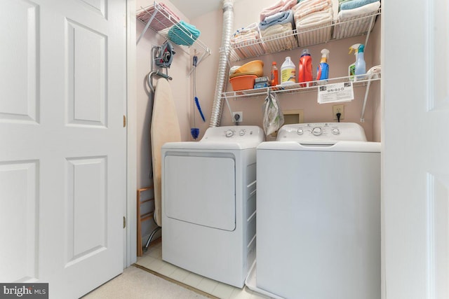 washroom with laundry area and washing machine and clothes dryer