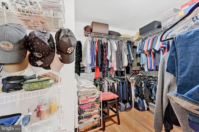 spacious closet with wood finished floors