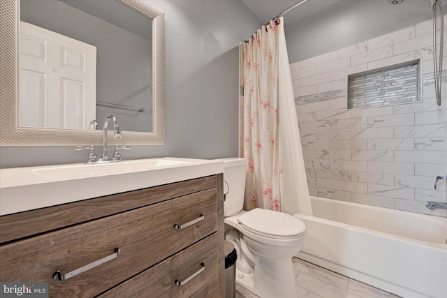 bathroom with marble finish floor, vanity, shower / bath combination with curtain, and toilet