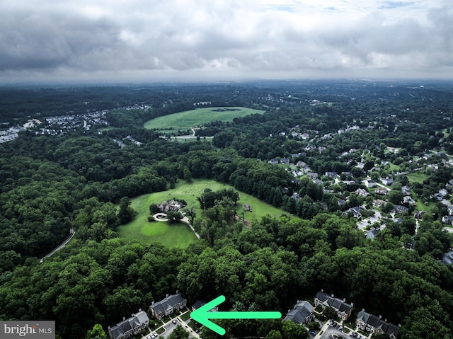 aerial view featuring a view of trees