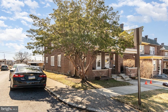 view of front of property with brick siding