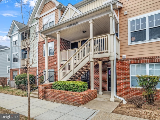 view of property featuring stairs