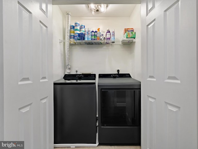 laundry room with laundry area and separate washer and dryer