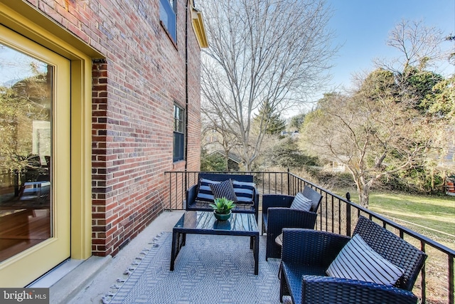 balcony with an outdoor hangout area