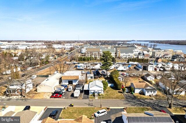 aerial view with a water view and a residential view