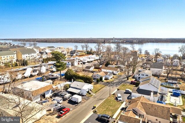 aerial view featuring a residential view and a water view