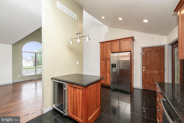 kitchen featuring wine cooler, recessed lighting, visible vents, granite finish floor, and appliances with stainless steel finishes