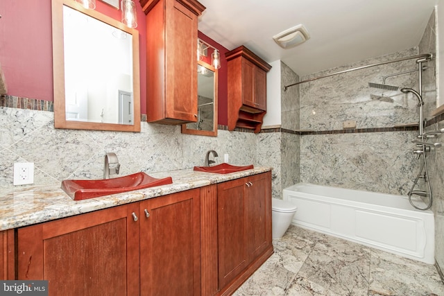 full bath featuring a sink, shower / tub combination, and double vanity