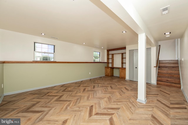 spare room with recessed lighting, visible vents, stairway, and baseboards