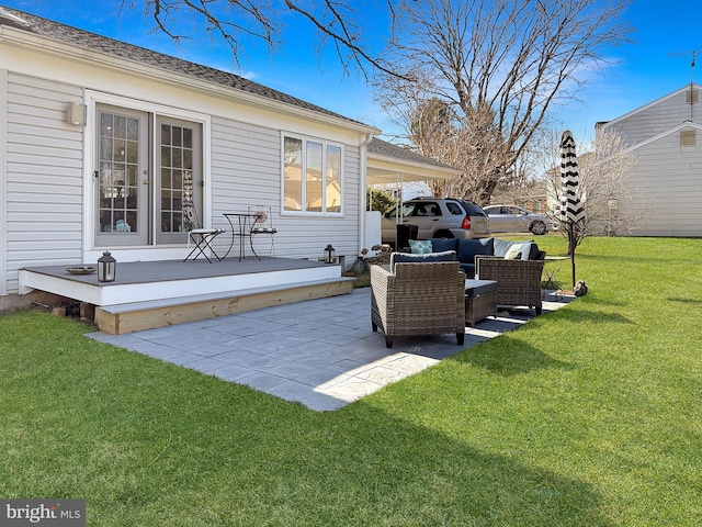 view of yard with an outdoor living space and a patio area