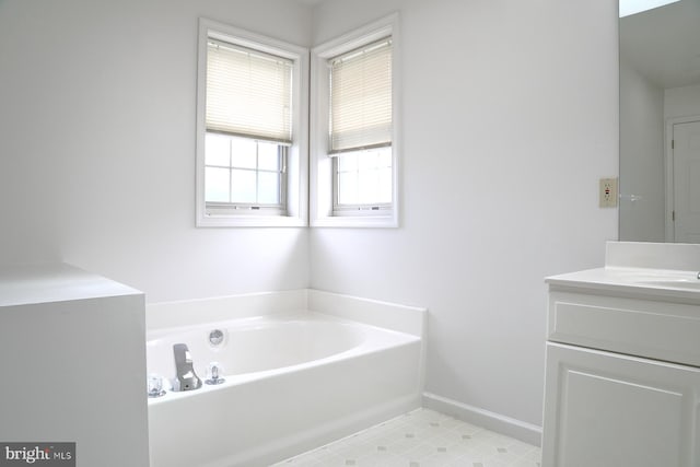 114 River Bend Park, Lancaster, PA 17602 - bathroom with a garden tub, vanity, baseboards, and tile patterned flooring