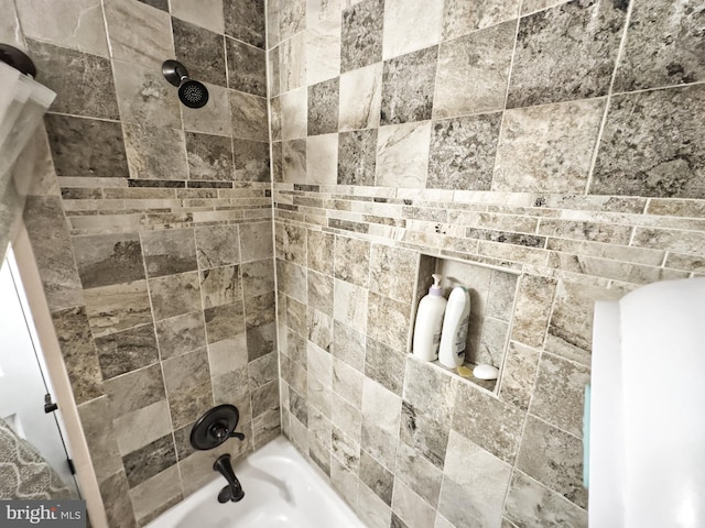 bathroom featuring shower / tub combination