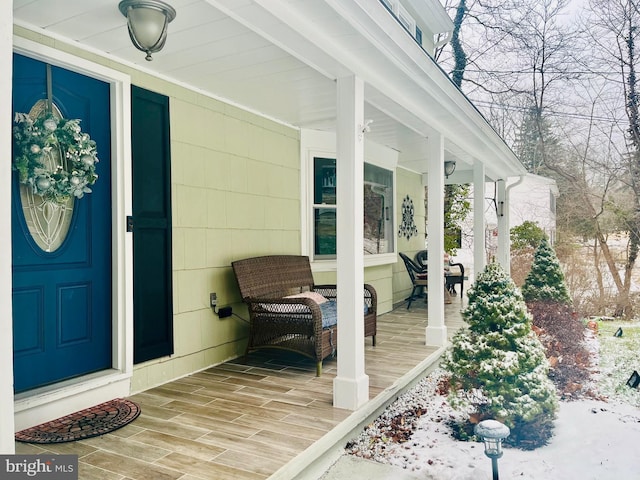 doorway to property with a porch