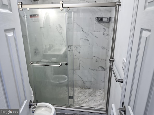 full bath with a stall shower and toilet