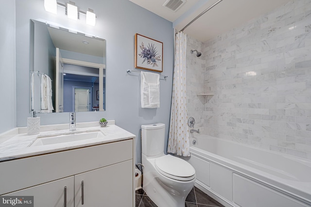 bathroom with visible vents, toilet, shower / tub combo with curtain, tile patterned floors, and vanity