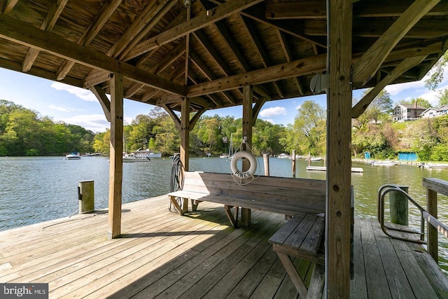 view of dock with a water view