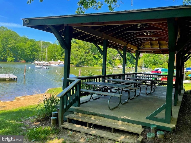 view of home's community featuring a water view and a gazebo