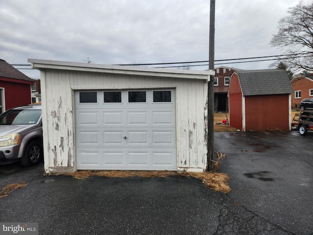 garage with driveway