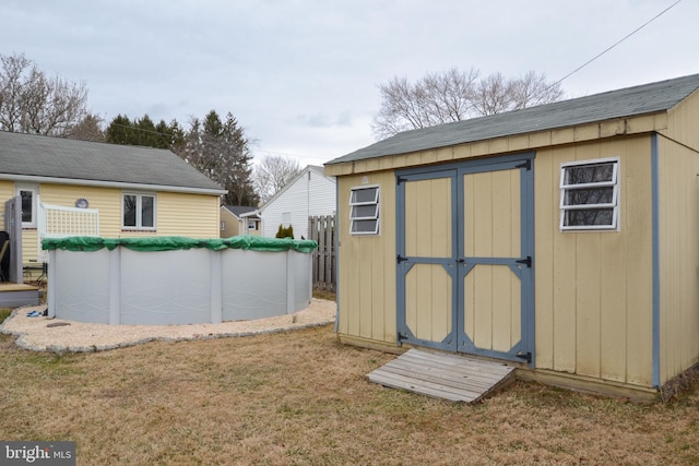 view of shed featuring a covered pool