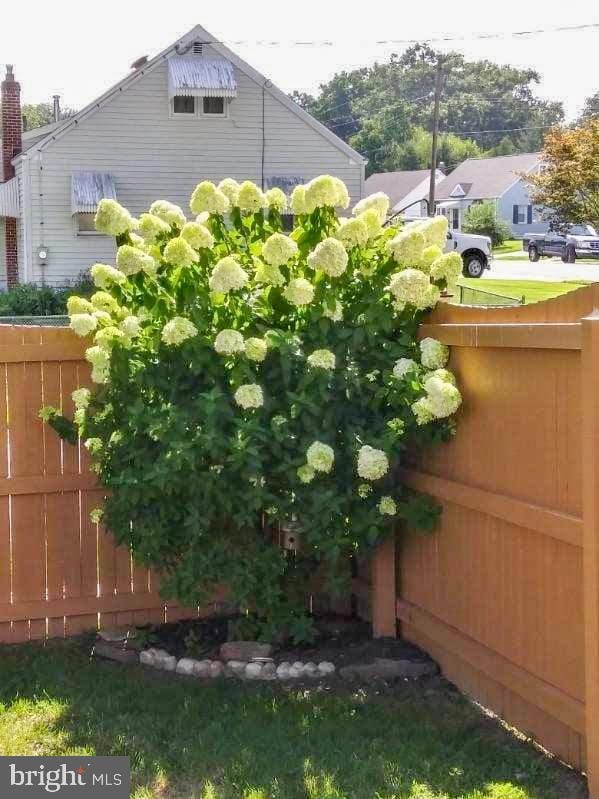 view of side of property with fence