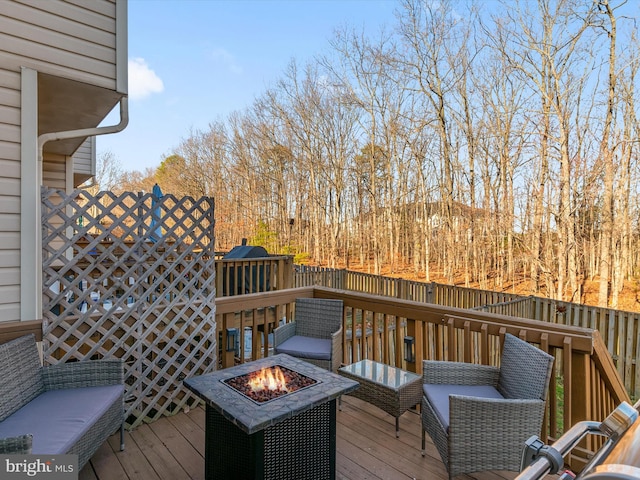 deck with a fire pit