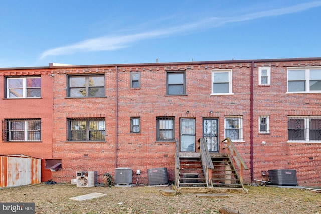 view of property featuring central air condition unit