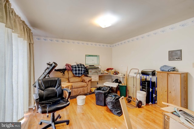 office space with wood finished floors