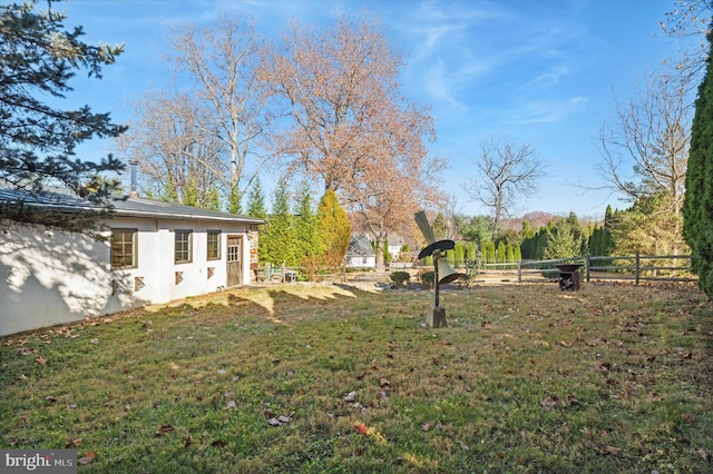 view of yard featuring fence