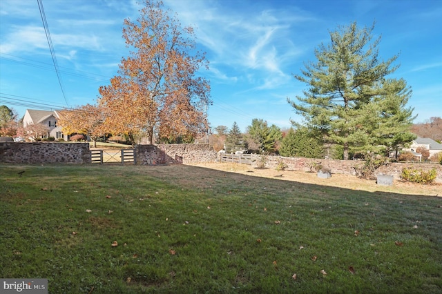 view of yard with fence