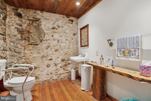 half bath featuring recessed lighting, wood ceiling, toilet, and wood finished floors