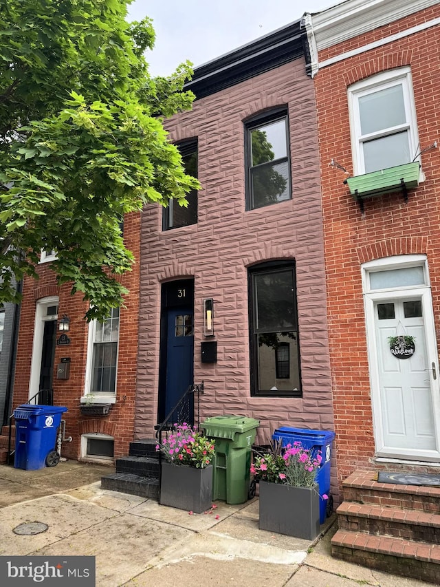 view of property featuring entry steps