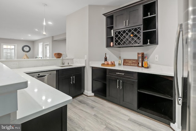 7911 Fort Hunt Rd, Alexandria, VA 22308 - kitchen featuring open shelves, appliances with stainless steel finishes, a sink, light countertops, and light wood-style floors