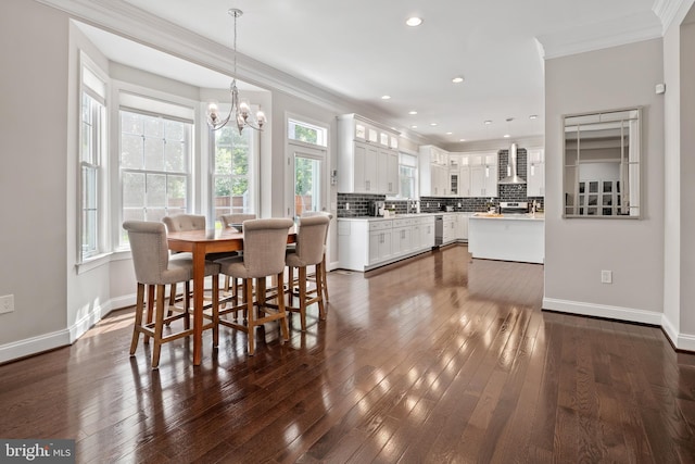 7911 Fort Hunt Rd, Alexandria, VA 22308 - dining area with crown molding, plenty of natural light, a chandelier, dark wood-style floors, and baseboards