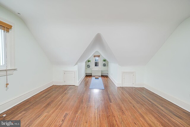1400 Montague St NW, Washington, DC 20011 - additional living space with baseboards, lofted ceiling, and wood finished floors