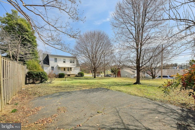 view of yard with fence