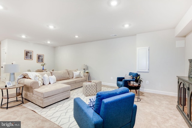 living room featuring light carpet, baseboards, visible vents, and recessed lighting