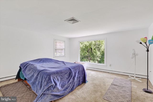 444 Rocksville Rd, Holland, PA 18966 - carpeted bedroom with a baseboard radiator